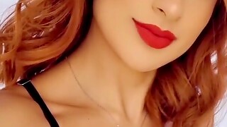 Close up video of a gorgeous chick smiling and having joke
